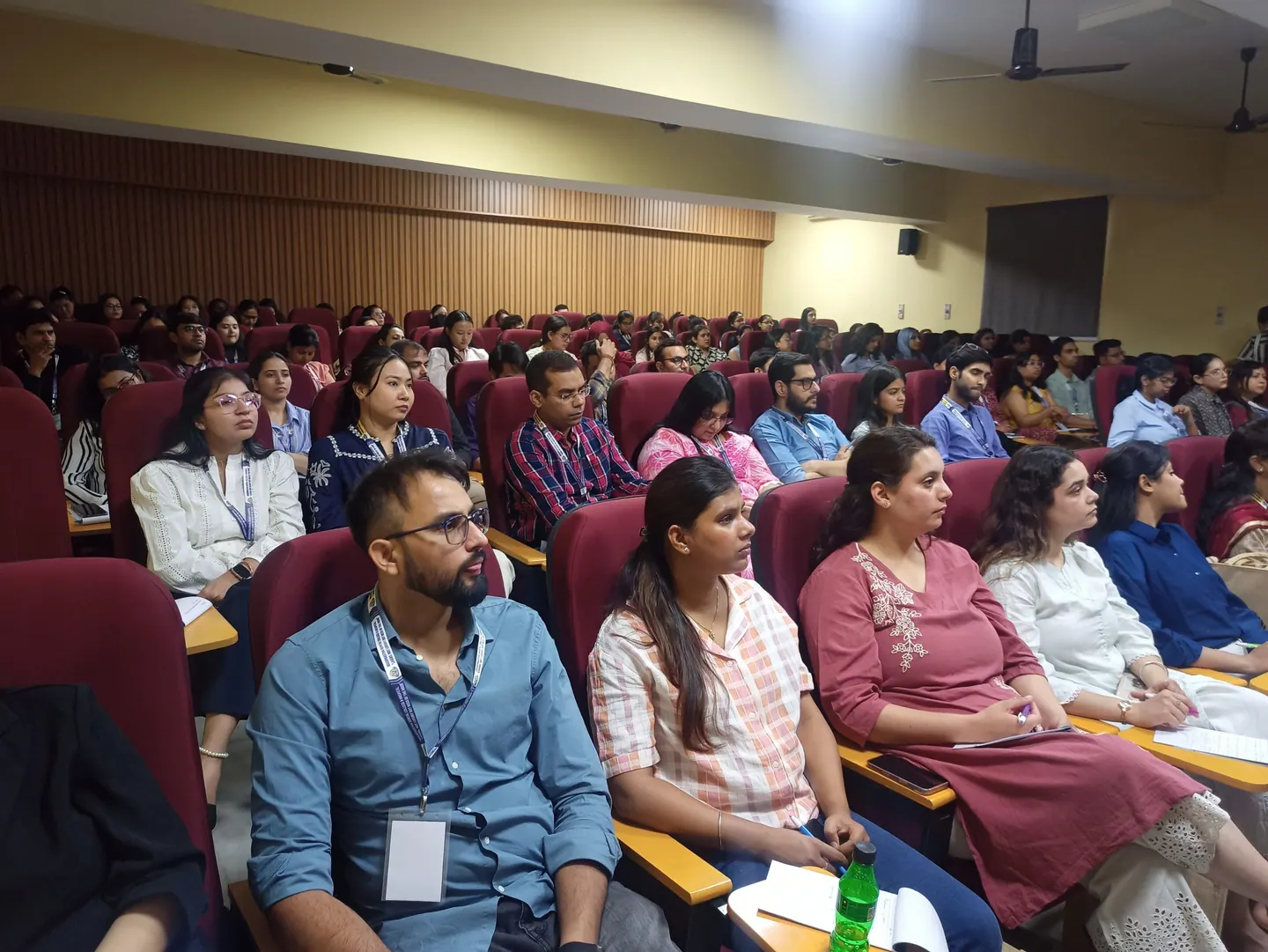 Students in the college auditorium