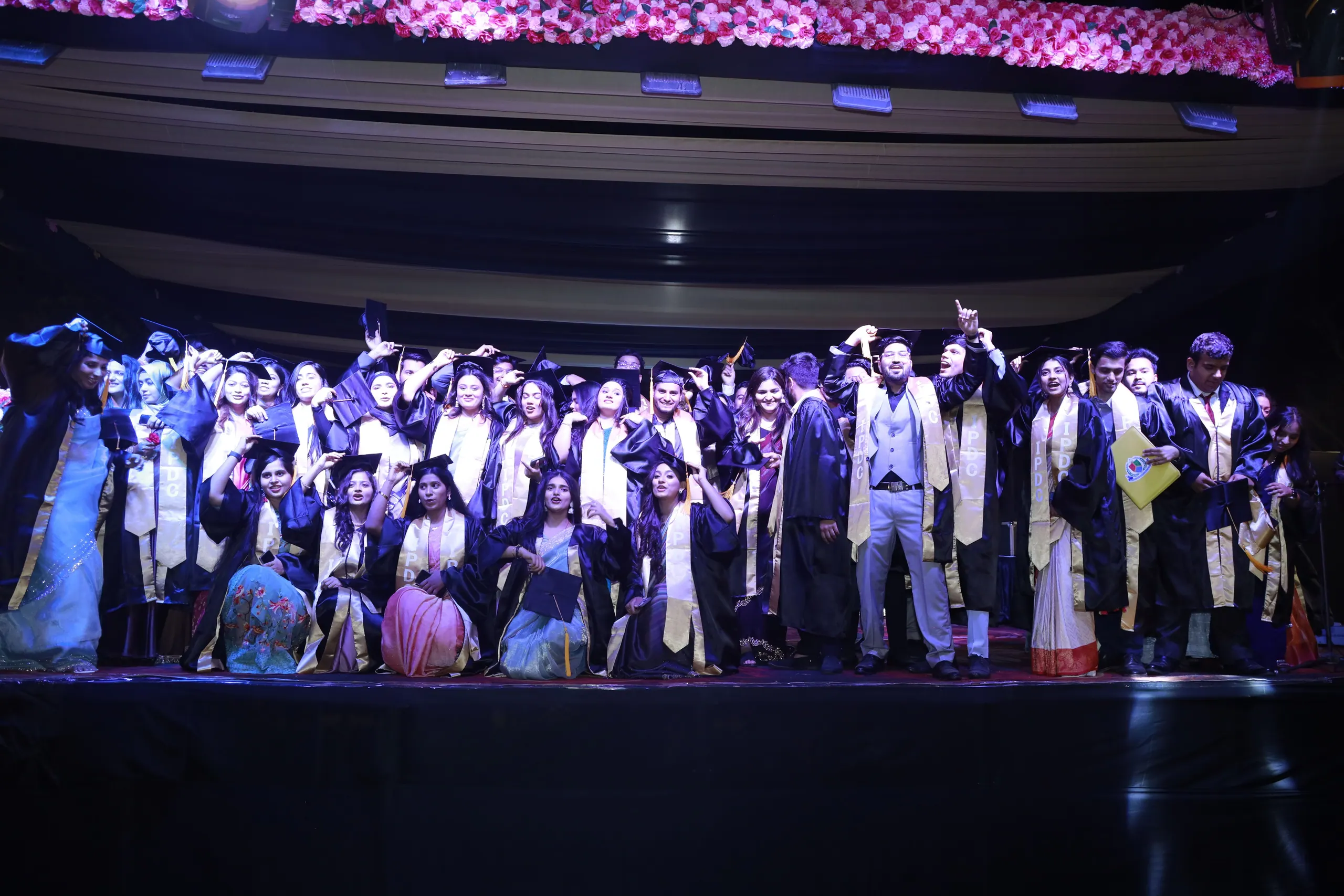 Graduates celebrating at convocation