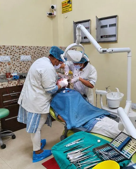 Minor operation theatre: a procedure in progress, Department of Oral & Maxillofacial Surgery, Inderprastha Dental College