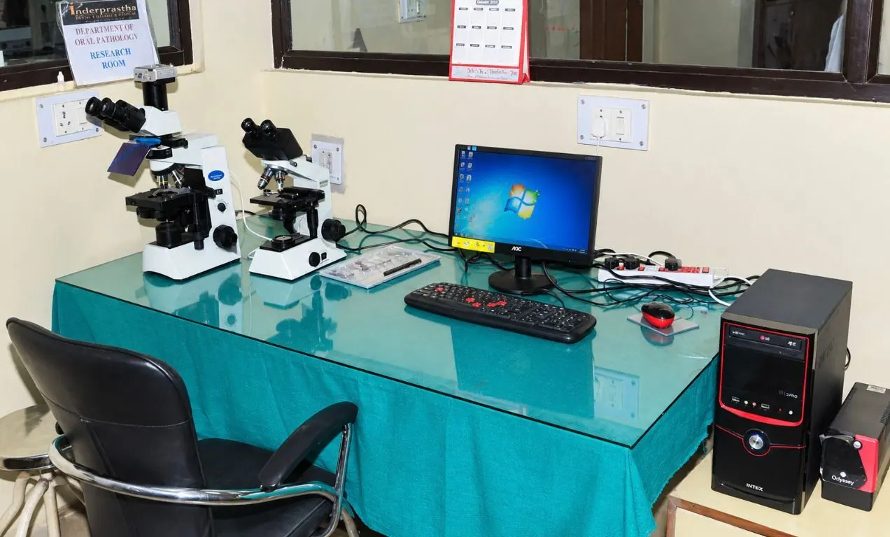 Research microscope with polarising, phase-contrast, dark-field and fluorescence attachments, Department of Oral Pathology & Microbiology, Inderprastha Dental College