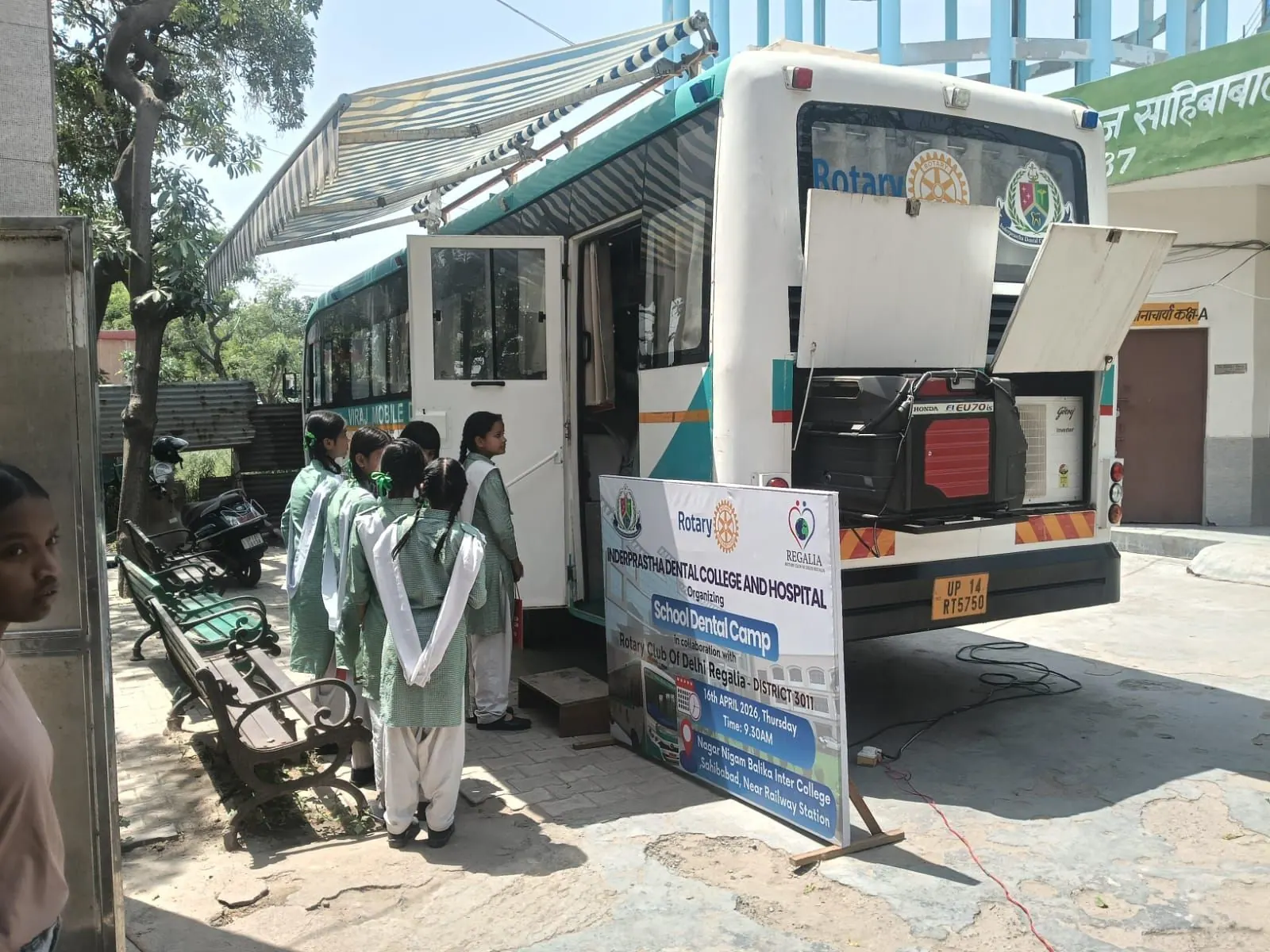 The mobile dental van at a school dental camp, Department of Public Health Dentistry, Inderprastha Dental College