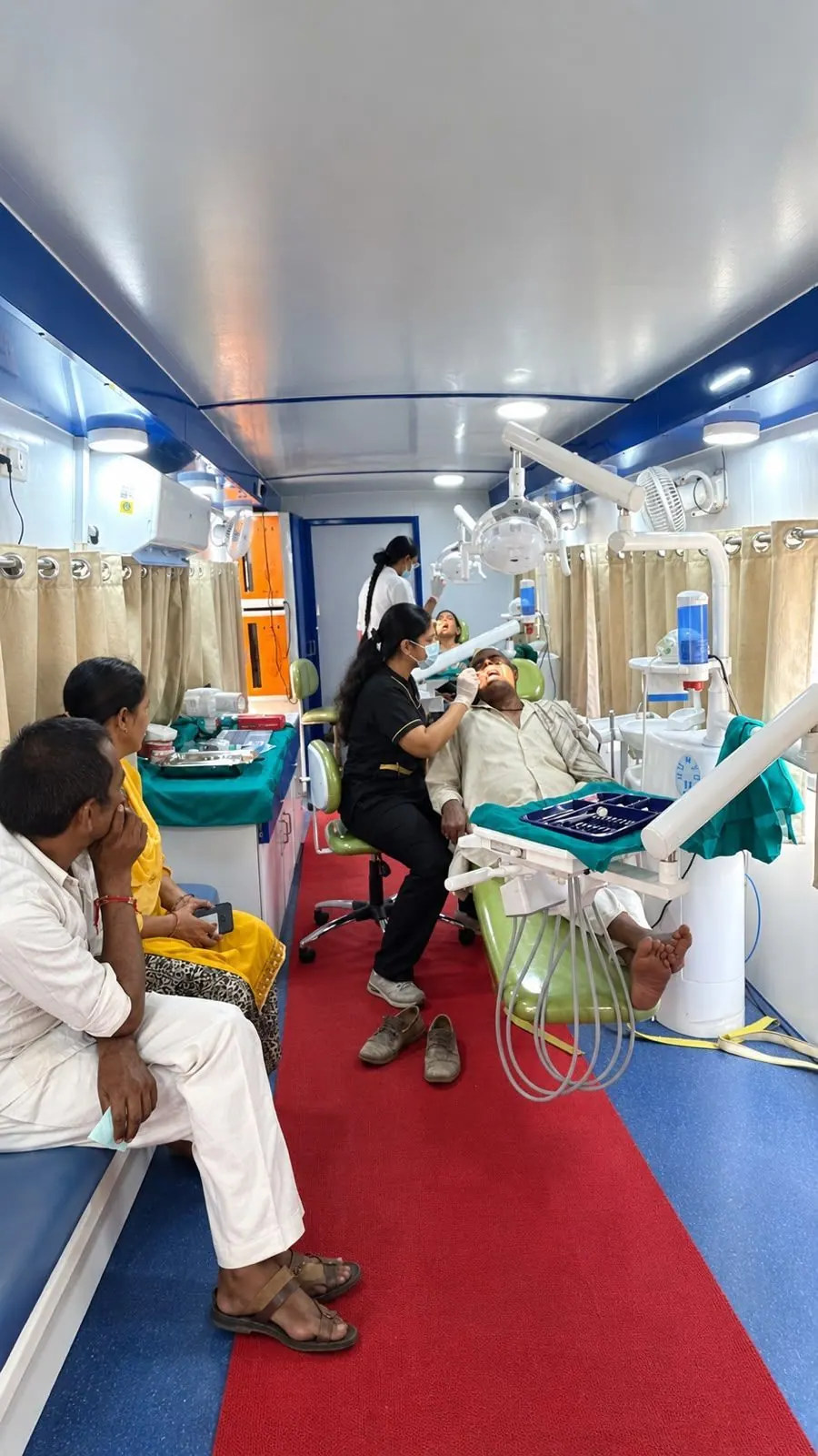 Treatment chairs inside the mobile dental van, Department of Public Health Dentistry, Inderprastha Dental College