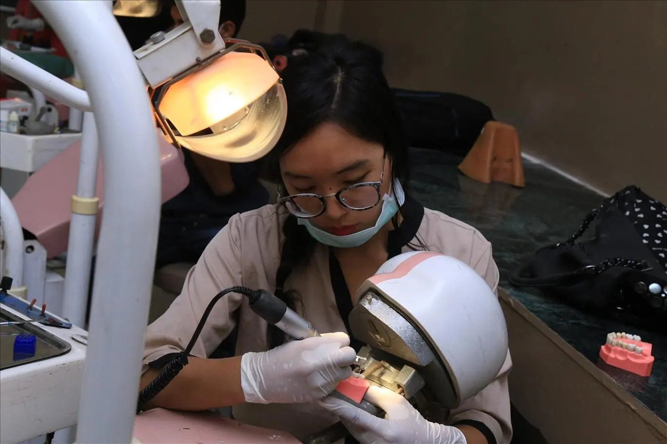 Students at a dental simulator lab